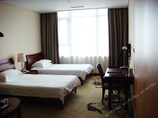 Imagen de la habitación del Hotel Highsure All Suite. Foto 6