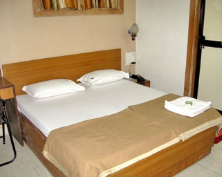 Imagen de la habitación del Hotel Highway Residency. Foto 6