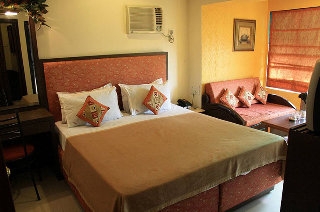 Imagen de la habitación del Hotel Highway Residency. Foto 7