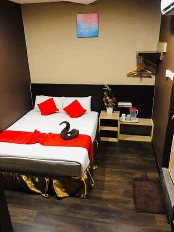 Imagen de la habitación del Hotel Highway Times Inn. Foto 7