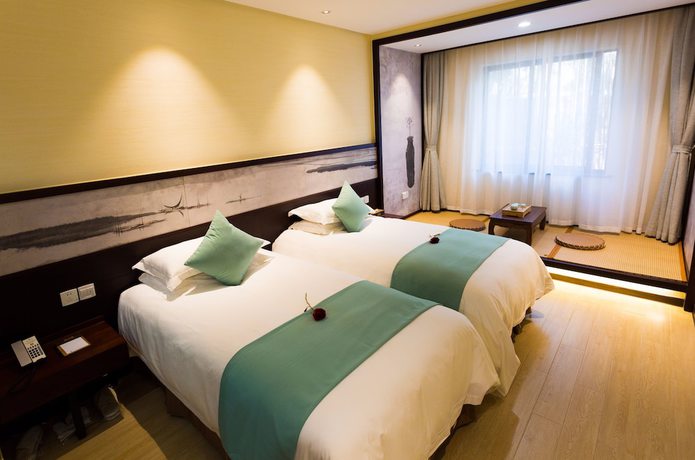 Imagen de la habitación del Hotel Hiking Hotel Hangzhou. Foto 9
