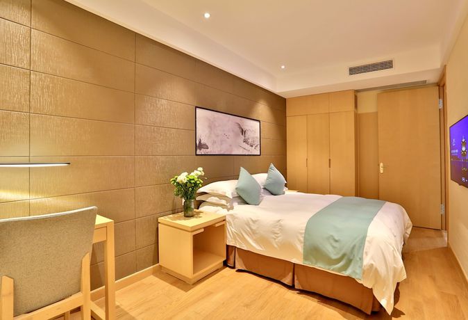 Imagen de la habitación del Hotel Hiking Hotel Hangzhou. Foto 11