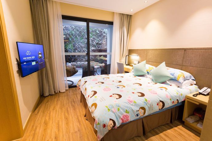 Imagen de la habitación del Hotel Hiking Hotel Hangzhou. Foto 13