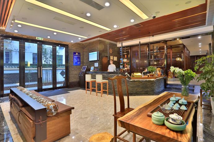 Imagen de los interiores del Hotel Hiking Hotel Hangzhou. Foto 20