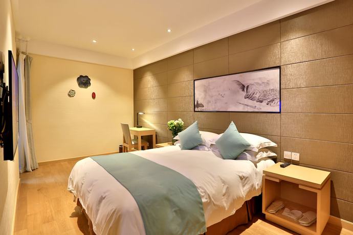 Imagen de la habitación del Hotel Hiking Hotel Hangzhou. Foto 18