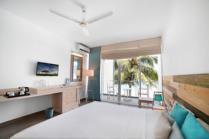 Imagen de la habitación del Hotel Hikkaduwa Beach. Foto 17