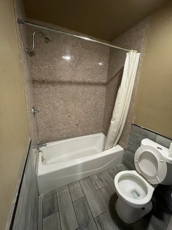 Imagen de la habitación del Hotel Hiland Motel. Foto 13