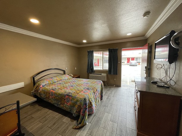 Imagen de la habitación del Hotel Hiland Motel. Foto 15