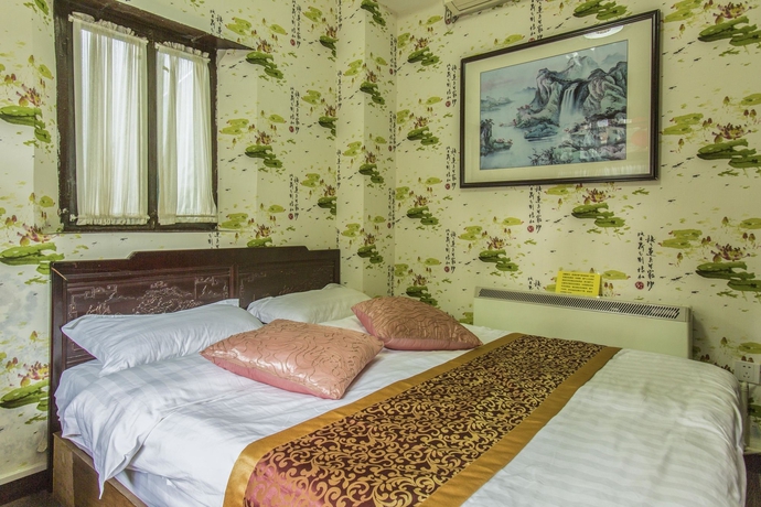 Imagen de la habitación del Hotel Hill Lily Courtyard. Foto 4