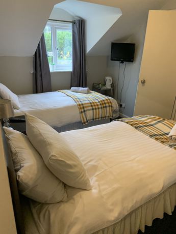 Imagen de la habitación del Hotel Hill Lodge. Foto 13