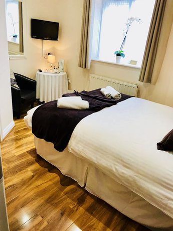 Imagen de la habitación del Hotel Hill Lodge. Foto 15