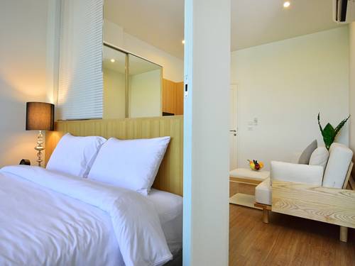 Imagen de la habitación del Hotel Hill Myna Condotel. Foto 7