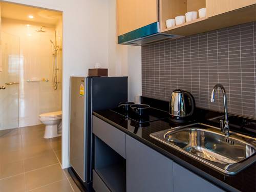 Imagen de la habitación del Hotel Hill Myna Condotel. Foto 12