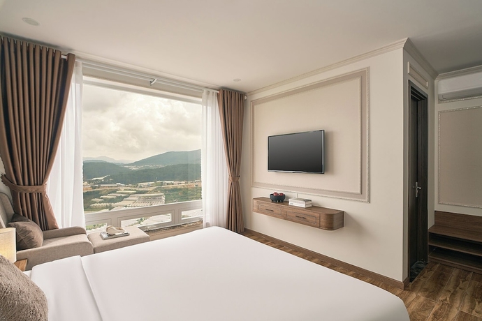 Imagen de la habitación del Hotel Hill Side Town. Foto 8