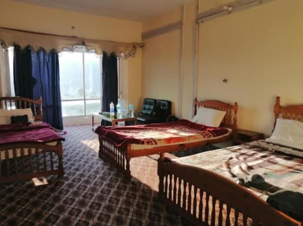 Imagen de la habitación del Hotel Hill Top Shogran. Foto 17