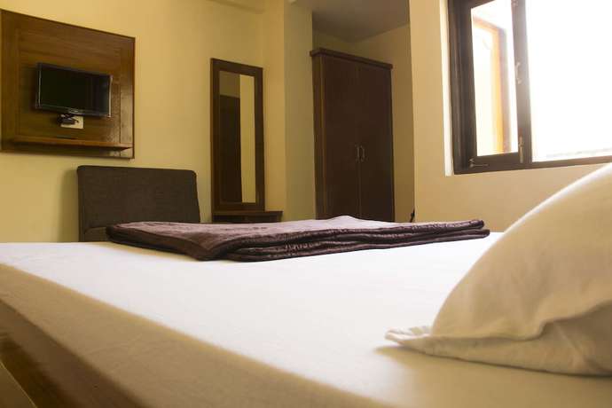 Imagen de la habitación del Hotel Hill Town. Foto 2