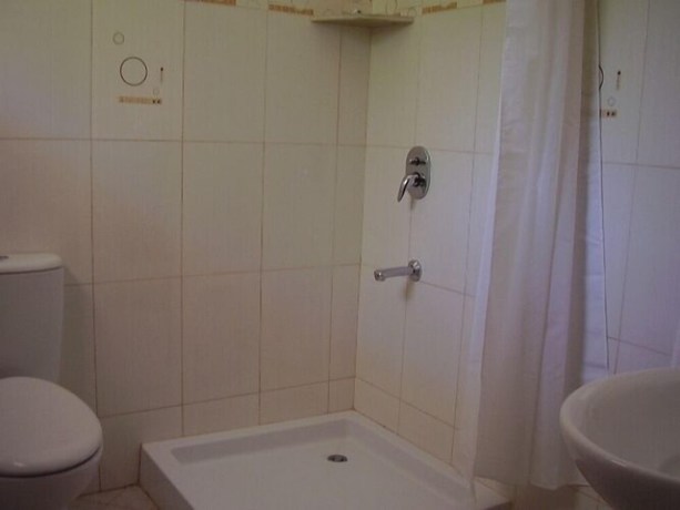 Imagen de la habitación del Hotel HillPark - Tiwi Beach. Foto 12