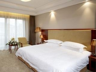 Imagen de la habitación del Hotel Hill&River Hangzhou. Foto 2