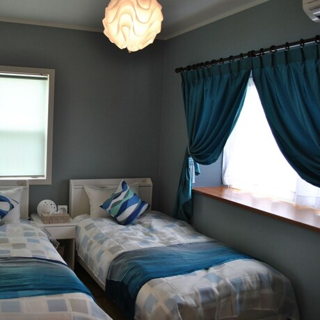 Imagen de la habitación del Hotel Hills Villa Miyakojima. Foto 23