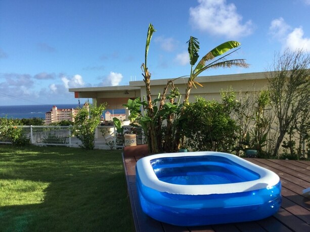 Imagen de la piscina del Hotel Hills Villa Miyakojima. Foto 29