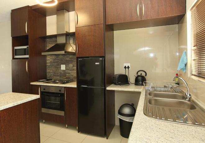 Imagen de la habitación del Hotel Hillside Executive Accommodation. Foto 3