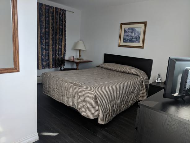 Imagen de la habitación del Hotel Hilltop Motel. Foto 6