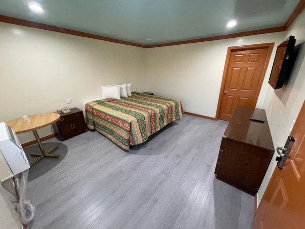 Imagen de la habitación del Hotel Hilltop Motor Inn. Foto 8