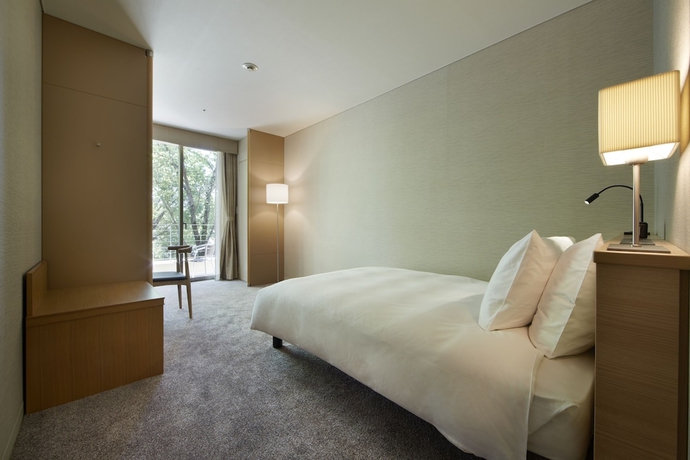 Imagen de la habitación del Hotel Hilltop Resort Fukuoka. Foto 2