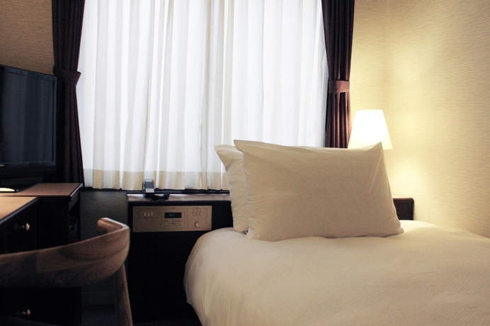 Imagen de la habitación del Hotel Hilltop Resort Fukuoka. Foto 3