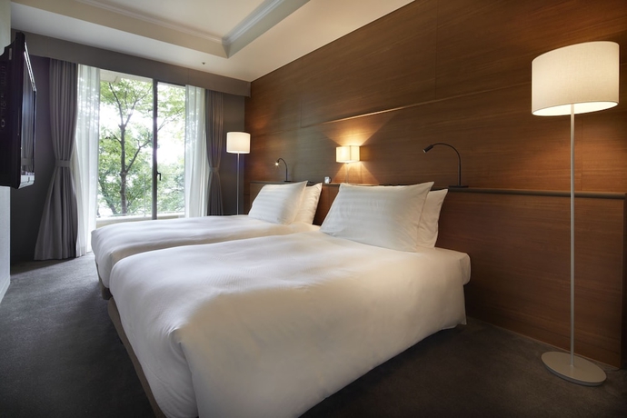 Imagen de la habitación del Hotel Hilltop Resort Fukuoka. Foto 5