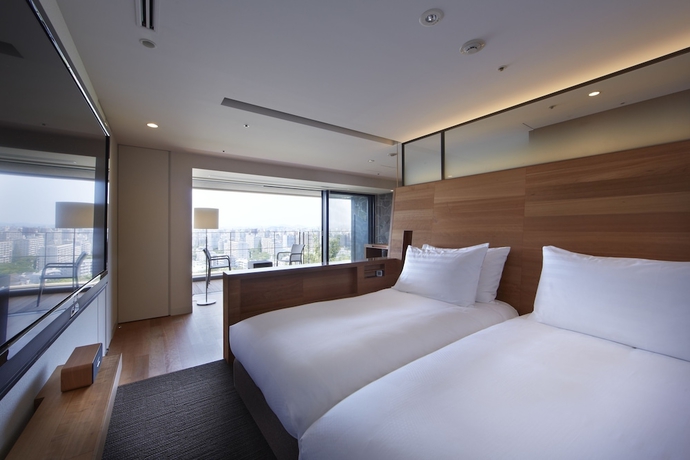 Imagen de la habitación del Hotel Hilltop Resort Fukuoka. Foto 17