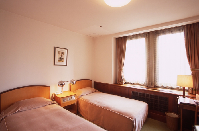 Imagen de la habitación del Hotel Hilltop, Tokyo Ciudad. Foto 11