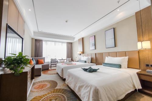 Imagen general del Hotel Hilmanhomeful - Caijia Subway Station. Foto 5