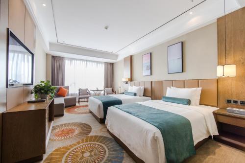 Imagen general del Hotel Hilmanhomeful - Caijia Subway Station. Foto 7