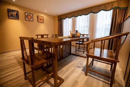 Imagen de la habitación del Hotel Hilmanhomeful - Caijia Subway Station. Foto 19