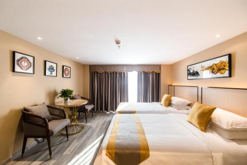 Imagen de la habitación del Hotel Hilmanhomeful - Caijia Subway Station. Foto 20