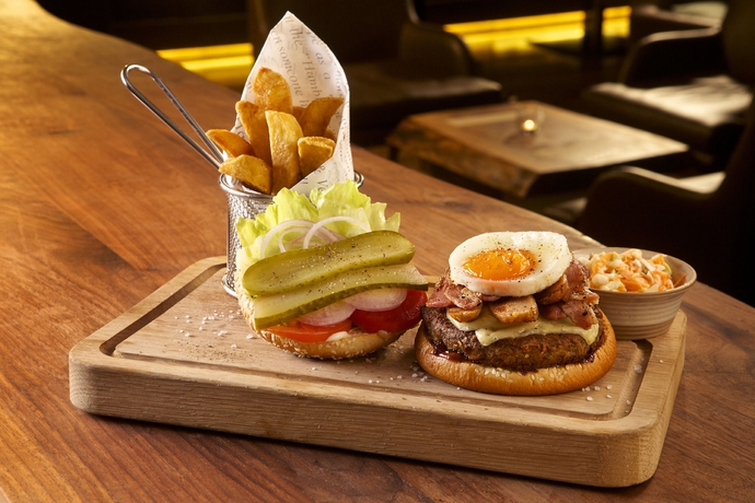 Imagen del bar/restaurante del Hotel Hilton Al Hamra Beach & Golf Resort. Foto 4