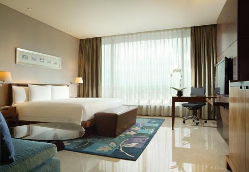 Imagen de la habitación del Hotel Hilton Bandung. Foto 8
