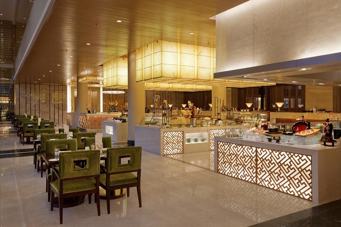 Imagen del bar/restaurante del Hotel Hilton Beijing Capital Airport. Foto 2