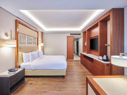 Imagen de la habitación del Hotel Hilton Cairo Nile Maadi. Foto 11