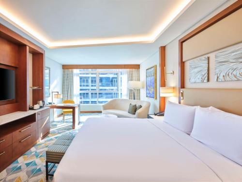 Imagen de la habitación del Hotel Hilton Cairo Nile Maadi. Foto 17