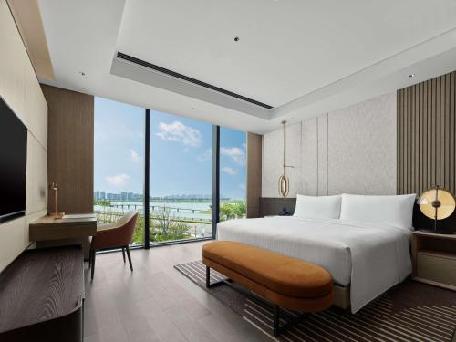 Imagen de la habitación del Hotel Hilton Changshu. Foto 11