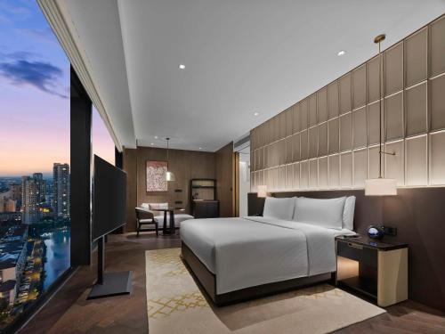 Imagen de la habitación del Hotel Hilton Changshu. Foto 12