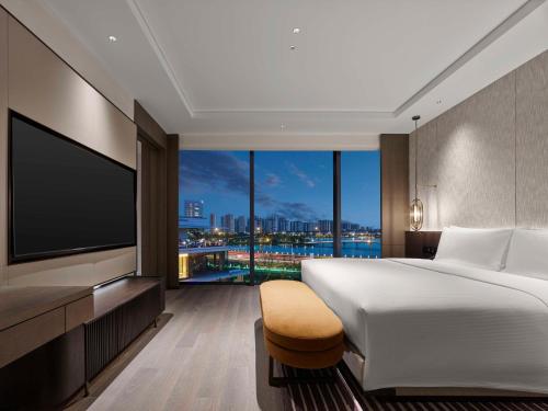 Imagen de la habitación del Hotel Hilton Changshu. Foto 13