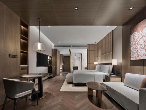 Imagen de la habitación del Hotel Hilton Changshu. Foto 15