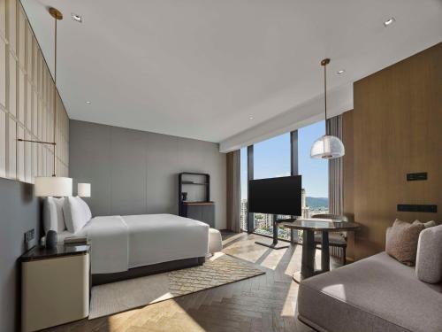 Imagen de la habitación del Hotel Hilton Changshu. Foto 16