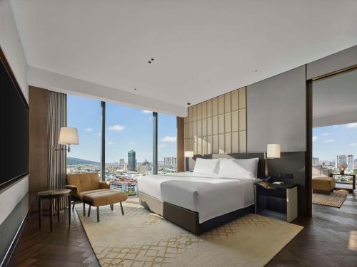 Imagen de la habitación del Hotel Hilton Changshu. Foto 17