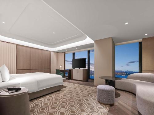 Imagen de la habitación del Hotel Hilton Changshu. Foto 19