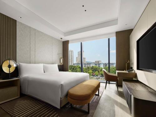 Imagen de la habitación del Hotel Hilton Changshu. Foto 20