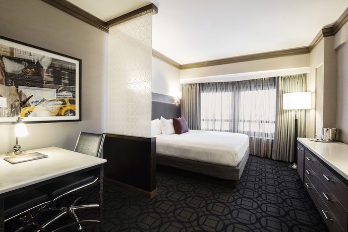 Imagen de la habitación del Hotel Hilton Club New York. Foto 5